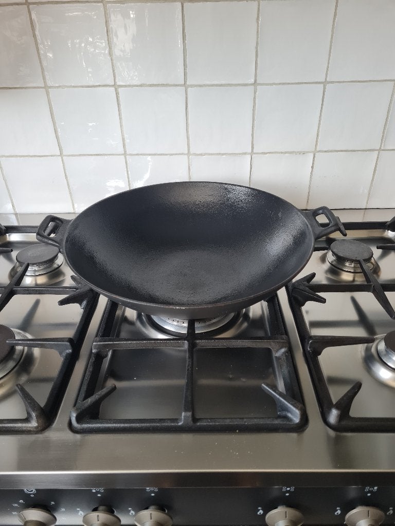 gietijzeren wok, Enlèvement, Fonte, Wok