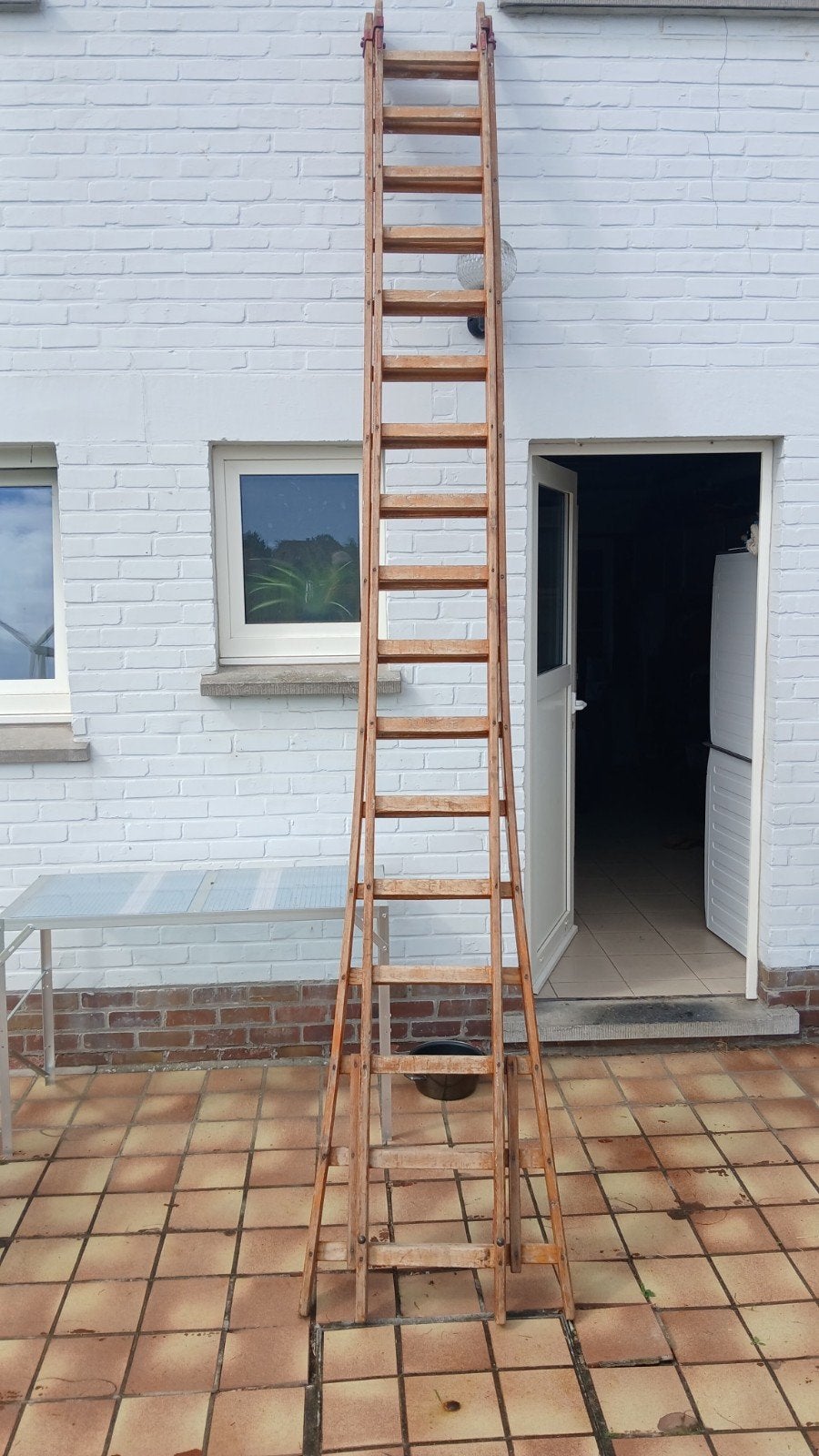 Ladder staan muur 7m, Ophalen