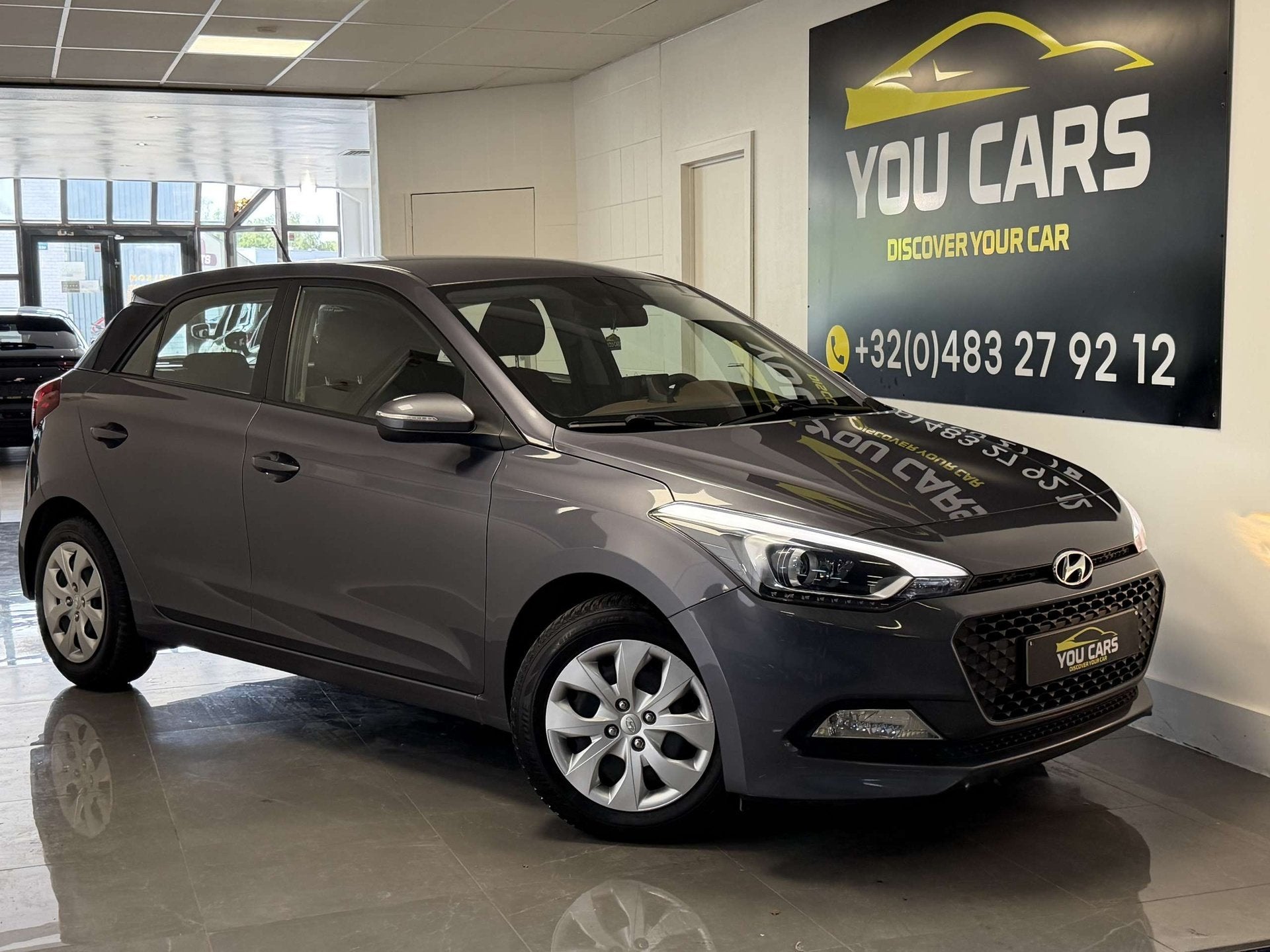 Hyundai i20 1.4i Intro Edition 1 Jaar Garantie, Auto's, Gebruikt, 4 cilinders, Blauw, Parkeersensor