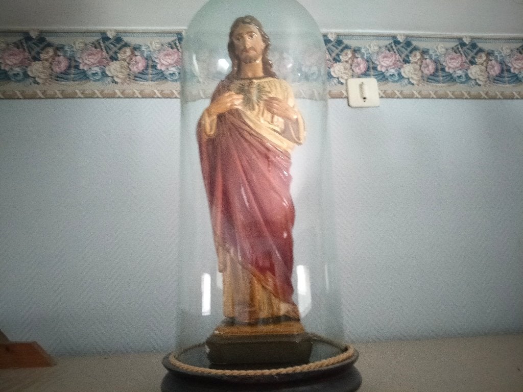 Heilig Hartbeeld van Jezus Christus onder stolp, Ophalen