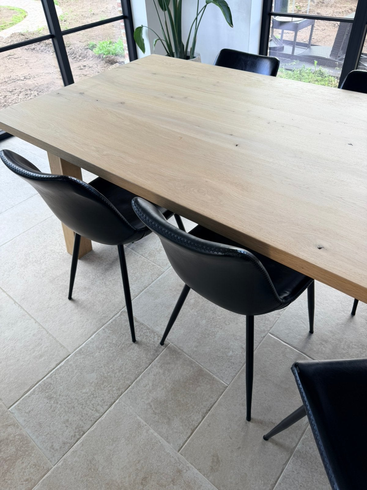 8 zwart lederen eetstoelen, Huis en Inrichting, Ophalen, Zo goed als nieuw, Zwart