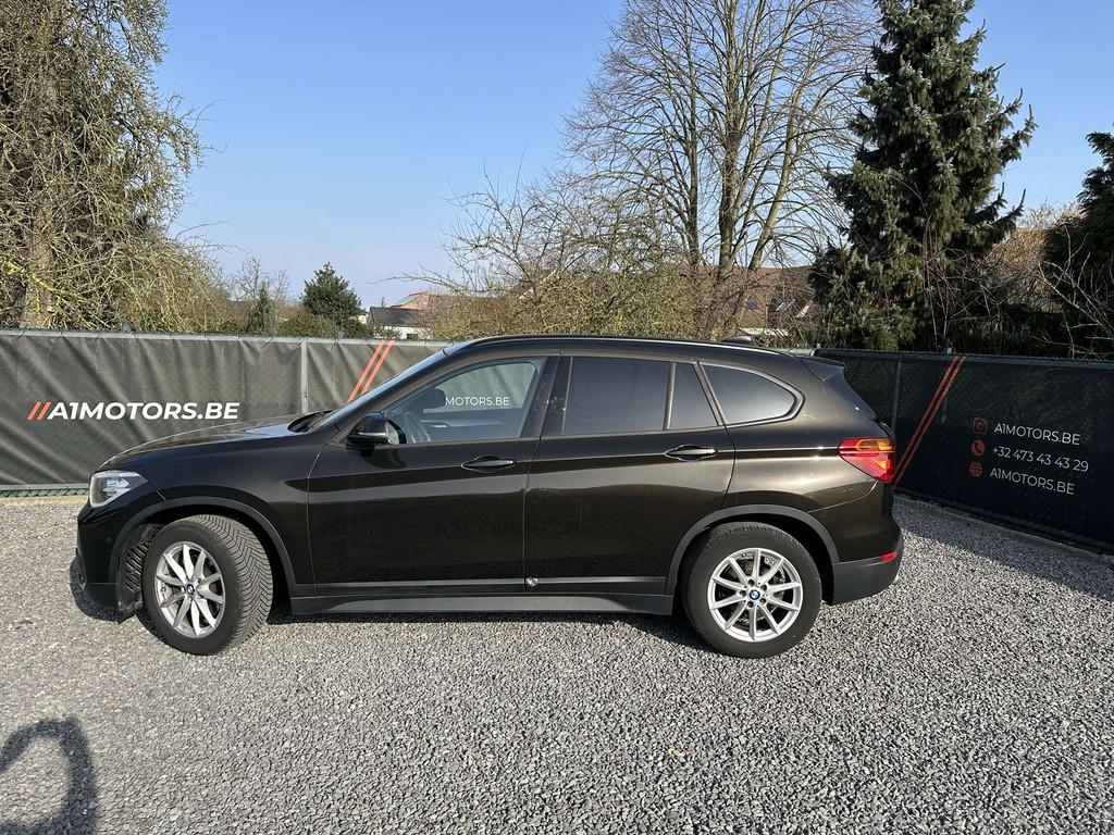 BMW X1 BENZINE | AUT | AIRCO | NAVI, Auto's, BMW, Gebruikt, Zwart, Leder, 3 cilinders