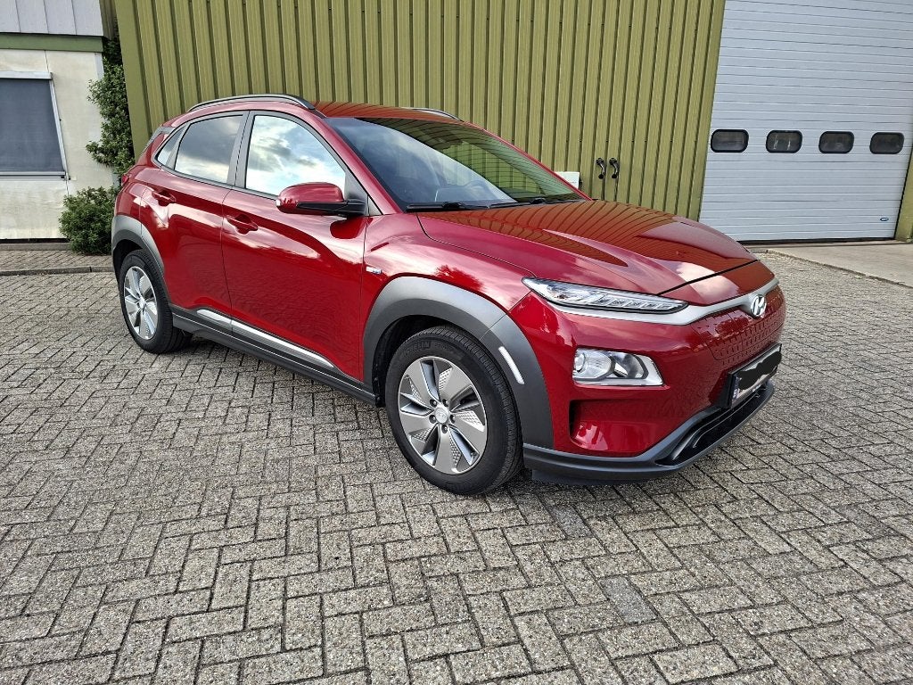 Hyundai Kona Electric 64kW Soh 100%, Auto's, Stof, Parkeersensor, SUV of Terreinwagen, Te koop
