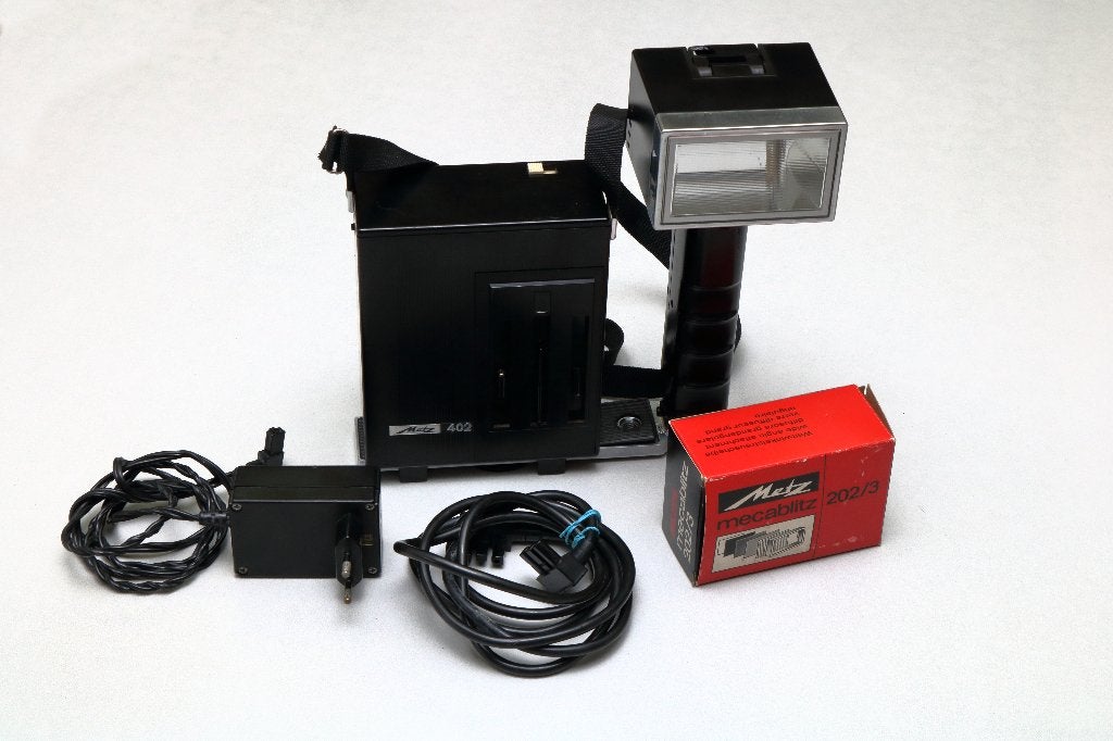 Mecablitz Metz 402 flash, TV, Hi-fi & Vidéo, Enlèvement ou Envoi, Flash externe, Utilisé, Inclinable