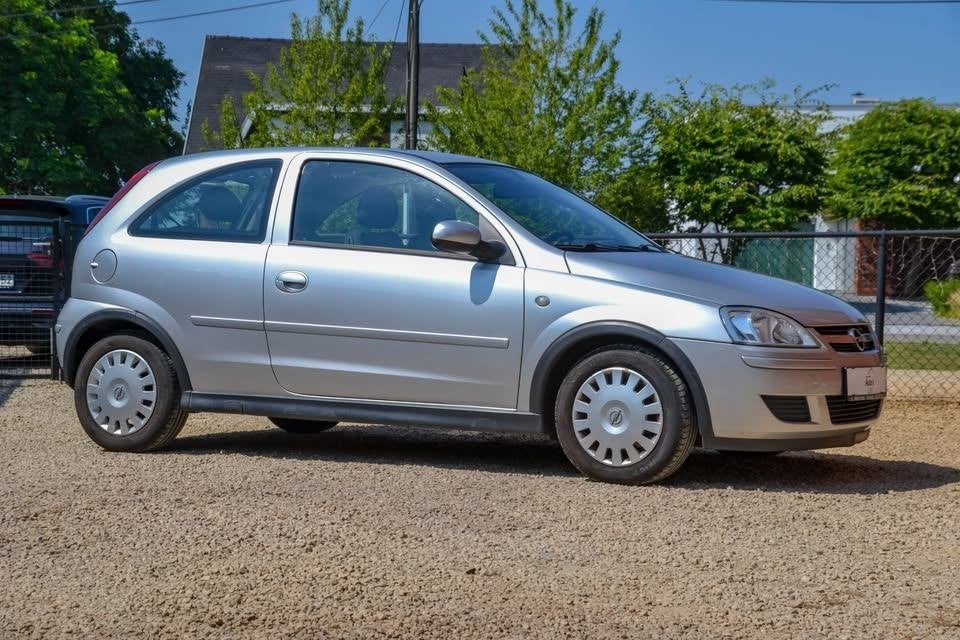Opel Corsa C 1.2 Twinport Benzine 2005, Auto's, Voorwielaandrijving, Stof, Zwart, 4 cilinders