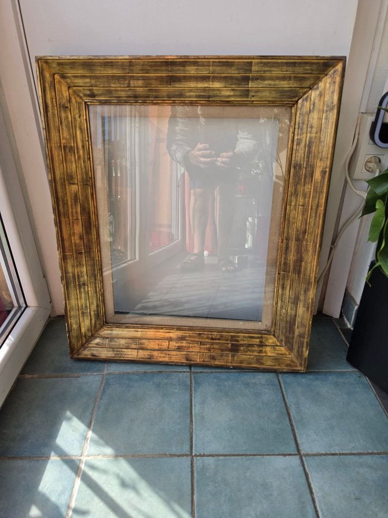 Groot antiek frame, Ophalen