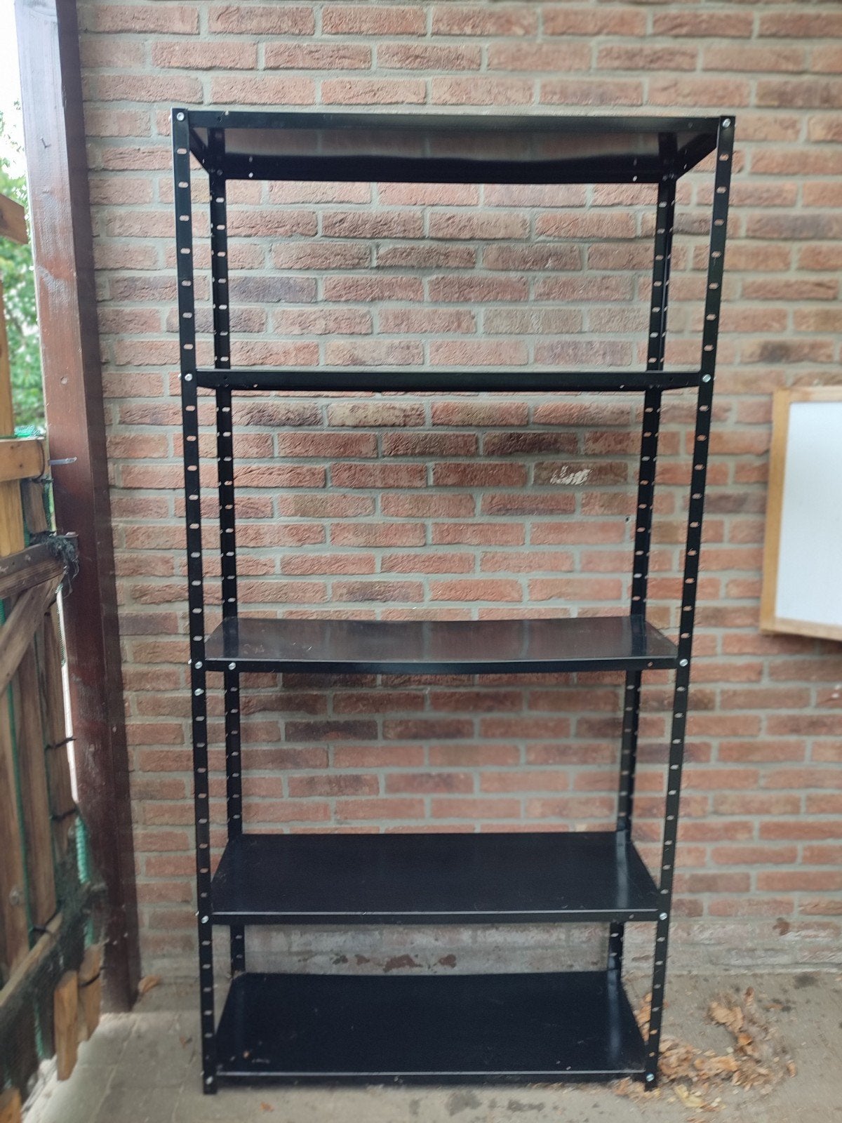 Zwart metalen rek, Ophalen
