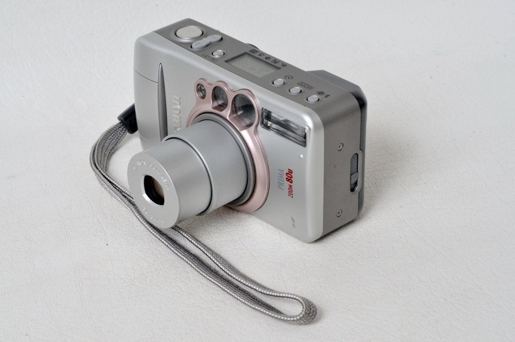 Canon Prima zoom 80 u + statief + gebruikershandleiding., Audio, Tv en Foto, Ophalen of Verzenden, Zo goed als nieuw, Compact