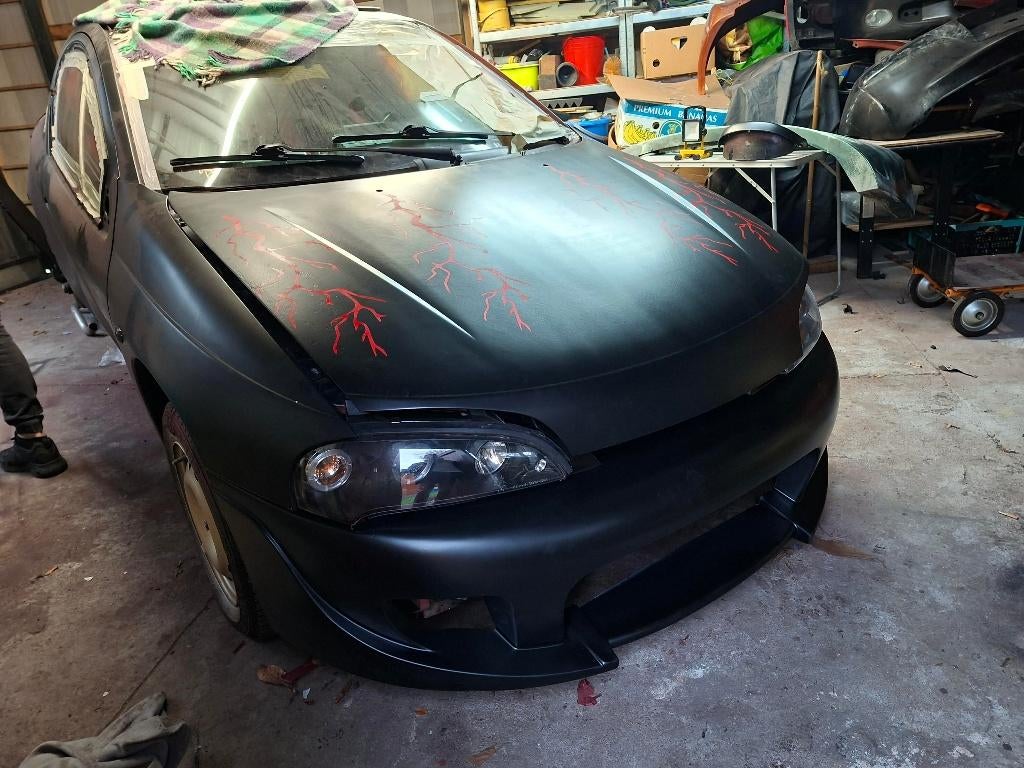 PROJECT opel tigra a 1996, Auto's, Voorwielaandrijving, 4 zetels, Zwart, Leder en Stof