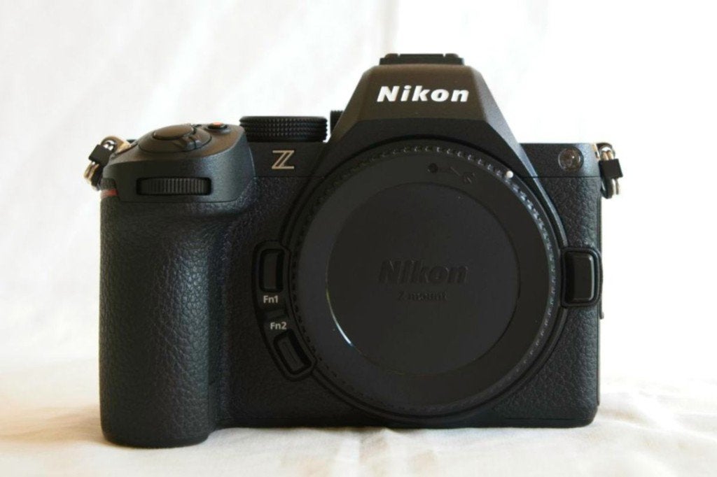 Nikon Z5II als nieuw, 2.400 kliks, garantie, met 35mm f1.4, TV, Hi-fi & Vidéo, Enlèvement ou Envoi, Moins de 4 fois, Comme neuf