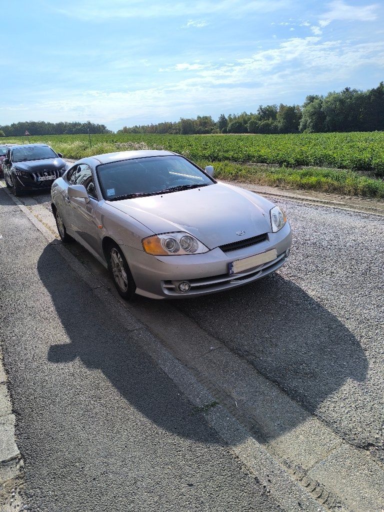 Hyundai coupé 2L année 2002, Autos, Hyundai, Argent ou Gris, Coupé, 102 kW, Boîte manuelle
