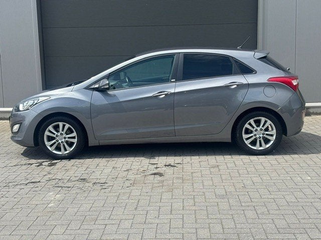 Hyundai I30 benzine 92.000km, Auto's, Voorwielaandrijving, Euro 5, Stof, Zwart