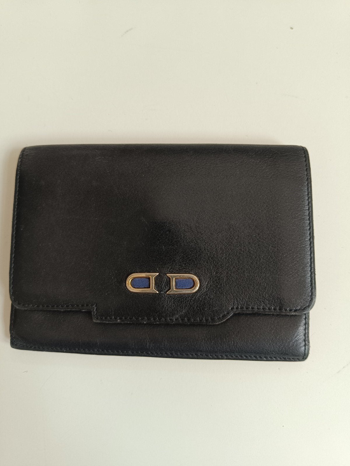 Portefeuille Delvaux Vintage, Ophalen