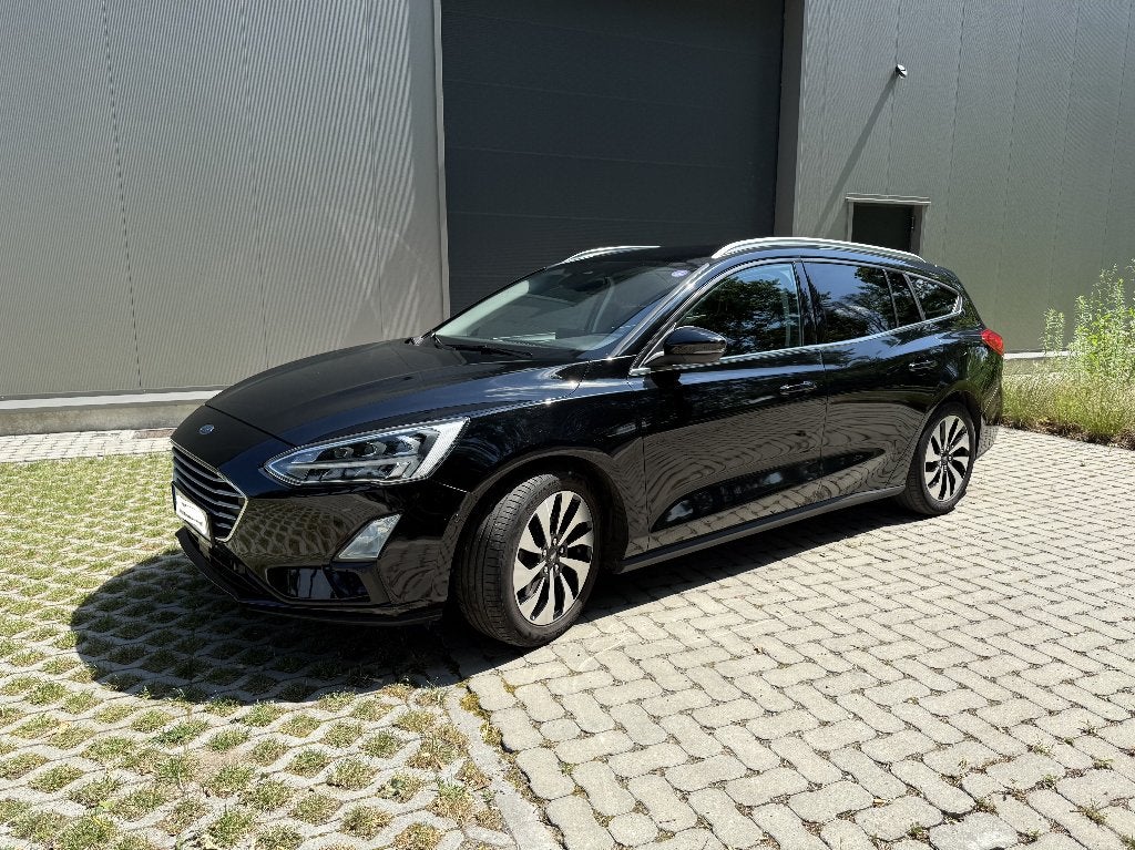 Ford Focus Wagon 1.0 EcoBoost (125 pk) Titanium, Winter-pack, Auto's, Stof, 1807 kg, 5 deurs, Particulier