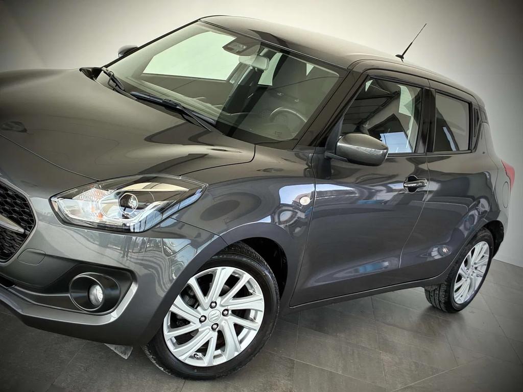 Suzuki Swift 1.2i HYBRID-1ERPRO-GPS-AIRCO-CAMERA-JANTES16-PD, Auto's, Suzuki, Automaat, Stof, Gebruikt, 4 cilinders
