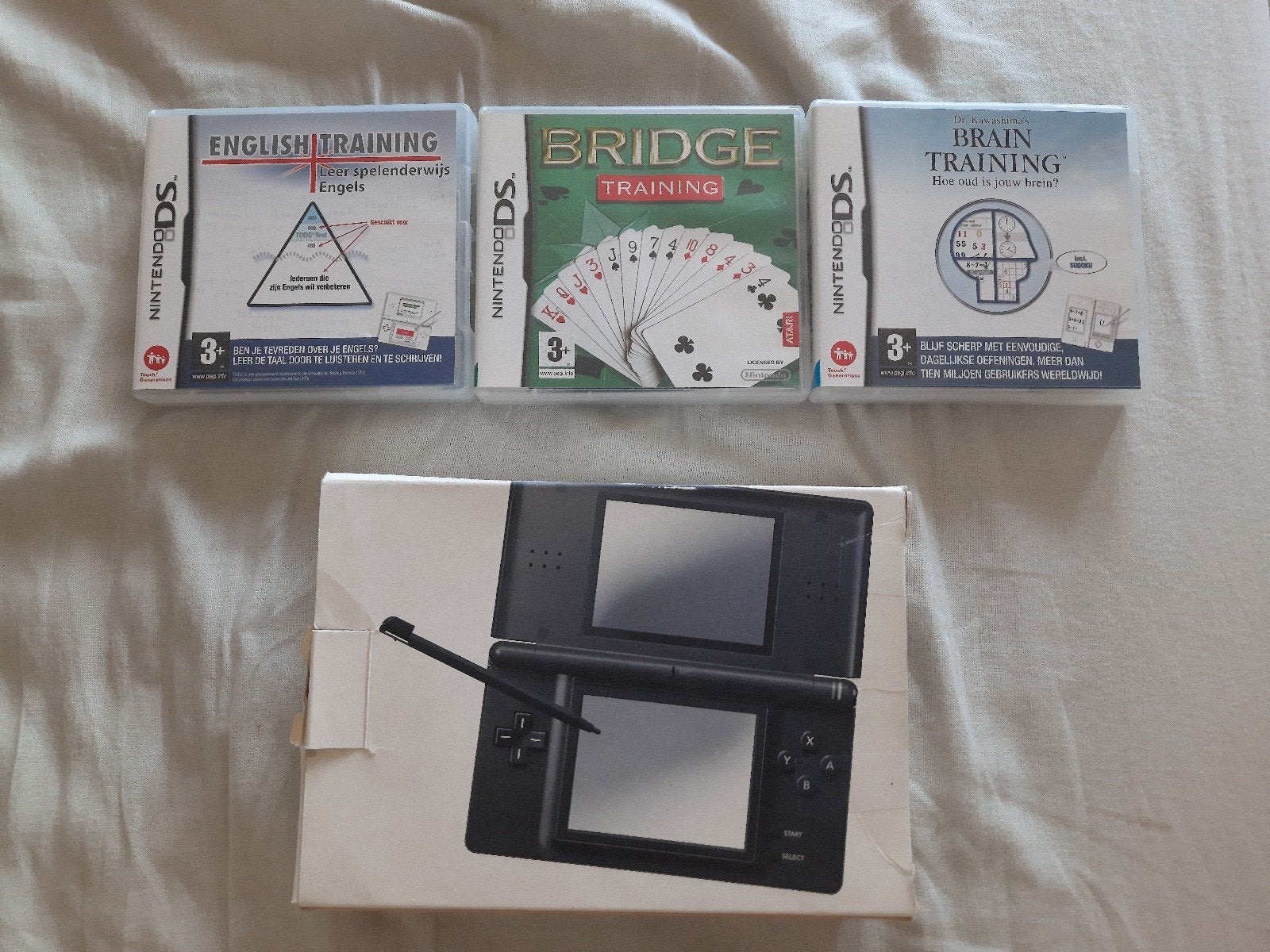 Nintendo DS Lite met 3 games, Consoles de jeu & Jeux vidéo, Consoles de jeu | Nintendo DS, Enlèvement ou Envoi, DS Lite