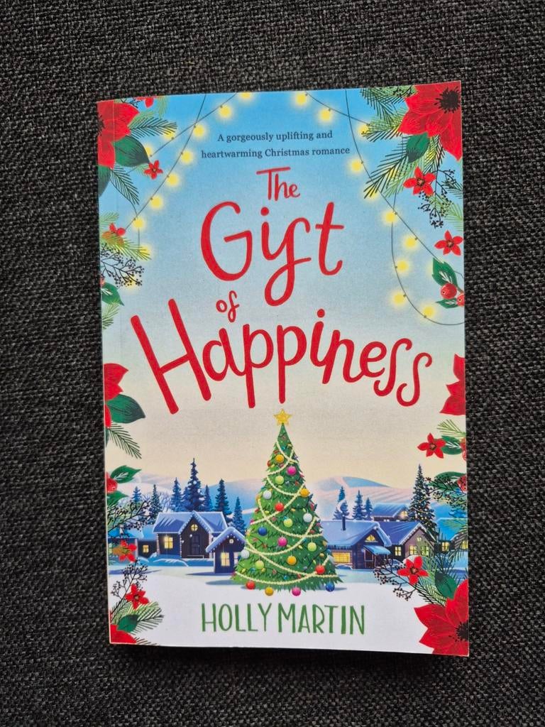 The gift of happiness - Holly Martin, Boeken, Ophalen of Verzenden, Gelezen, Holly martin