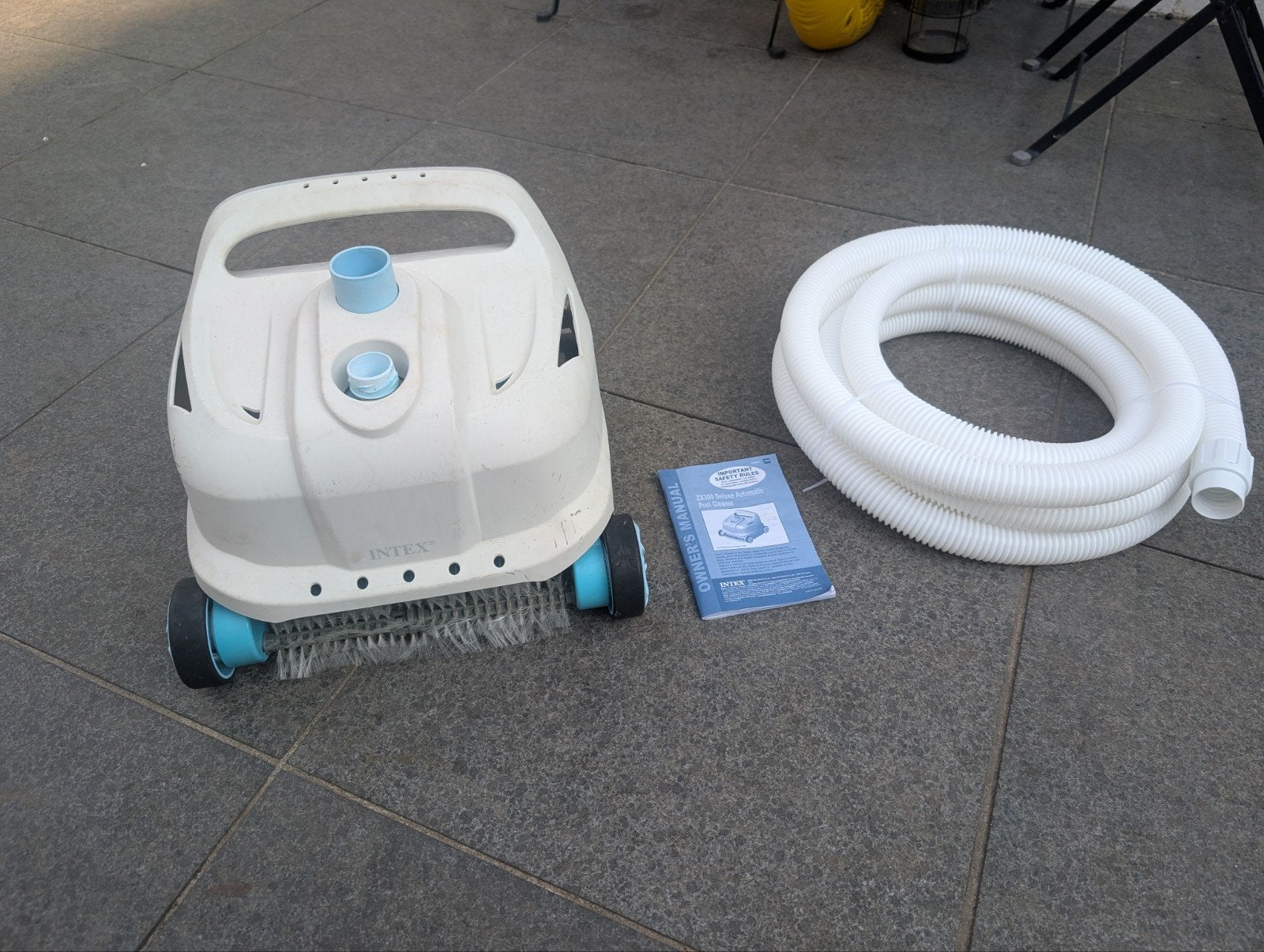 INTEX ZX300 zwembadstofzuiger, Ophalen