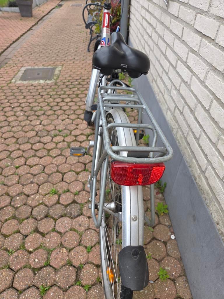 Damesfiets te koop, Ophalen