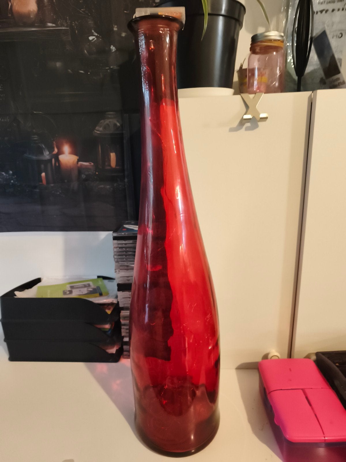 Glazen fles rood, Ophalen