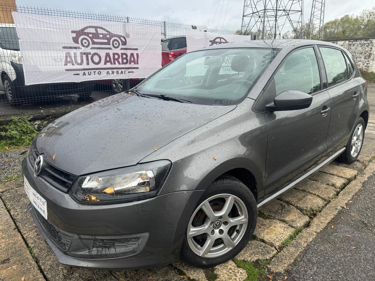 Volkswagen Polo 1.2i Essence Comfortline 90.000km 2010 EURO5, Voorwielaandrijving, Stof, Zwart, https://public.car-pass.be/vhr/16f5bf36-d2c2-4429-93a6-058f82e02ce9
