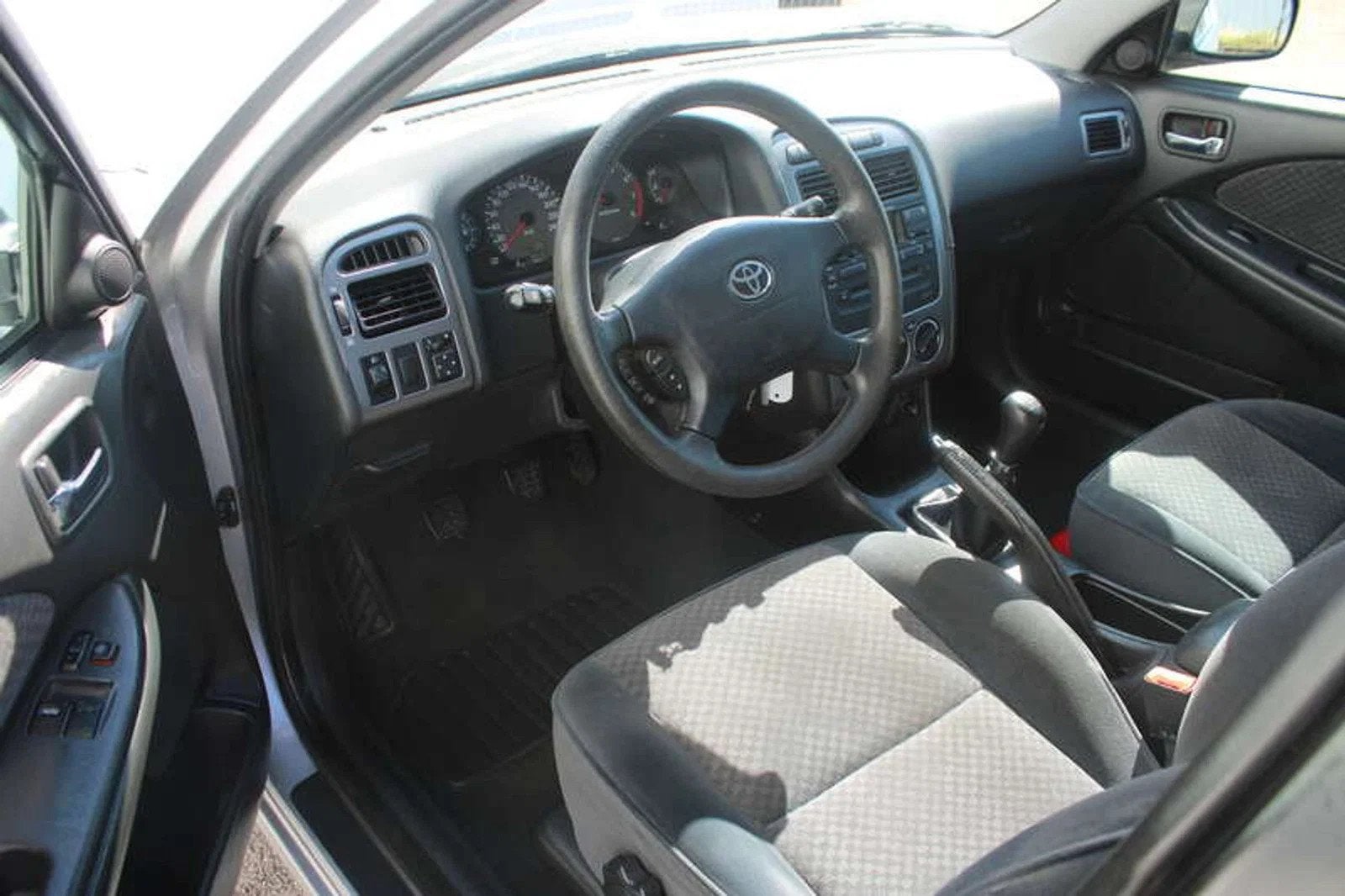 Toyota Avensis 1.6i 1ste eigenaar 1 JAAR garantie!, Auto's, 4 deurs, 4 cilinders, Bedrijf, Grijs