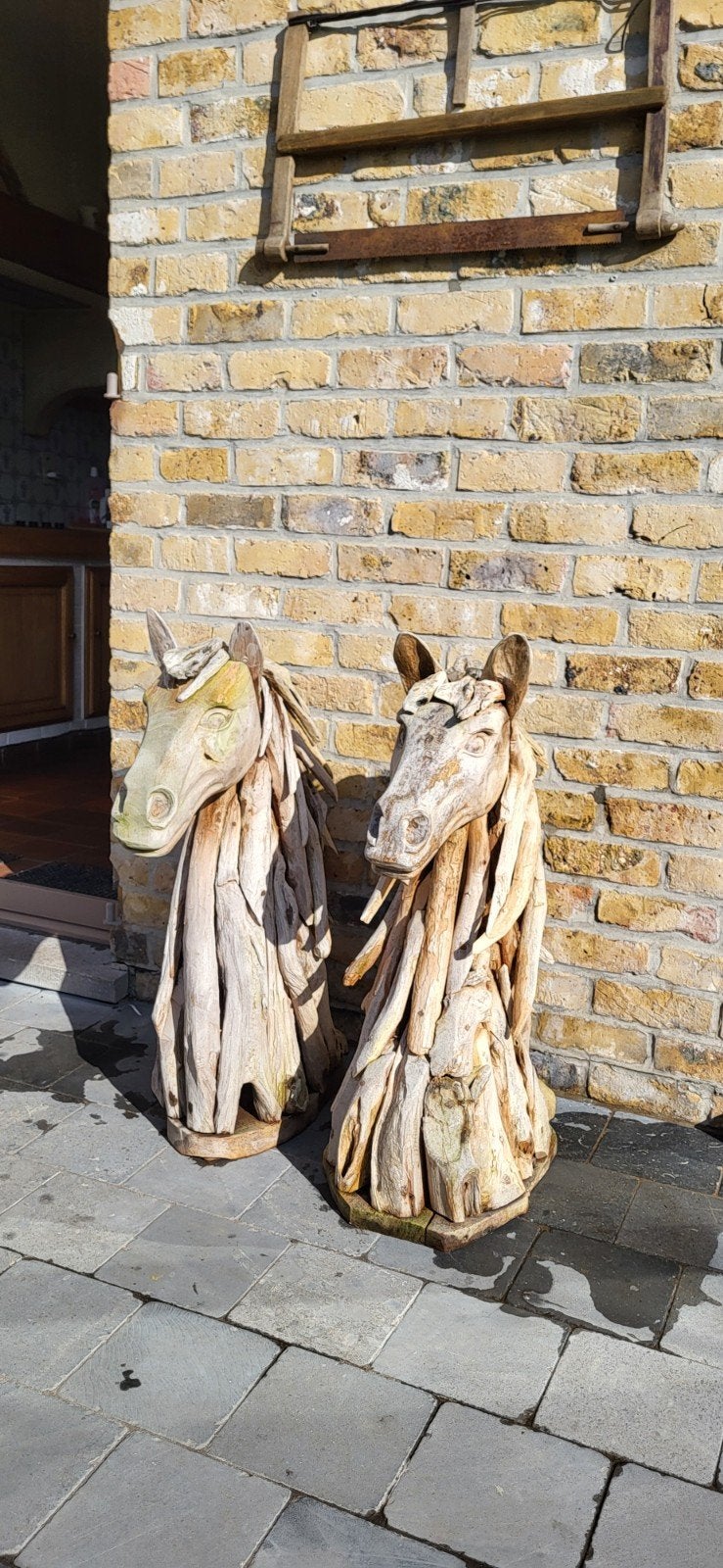 Houten Paardenkoppen ., Enlèvement