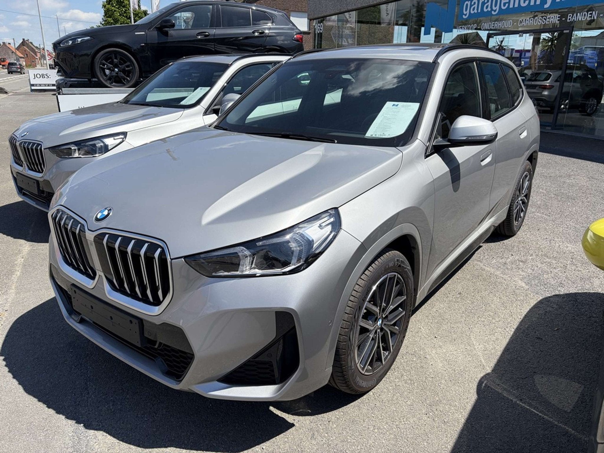 BMW X1 sDrive18i MHEV M Sport | Panodak | Sfeer | Camera | A, Auto's, BMW, Gebruikt, Zwart, 136 pk, Bedrijf