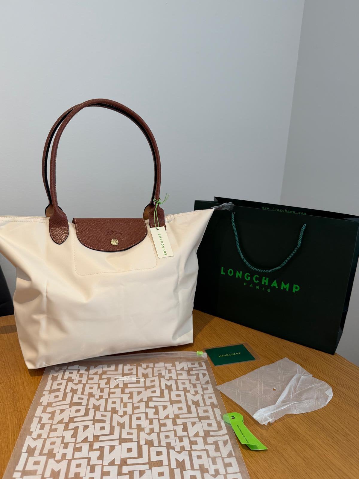 Longchamp de opvouwbare draagtas in papierwitte kleur, Ophalen of Verzenden, Nieuw, Wit, Overige typen