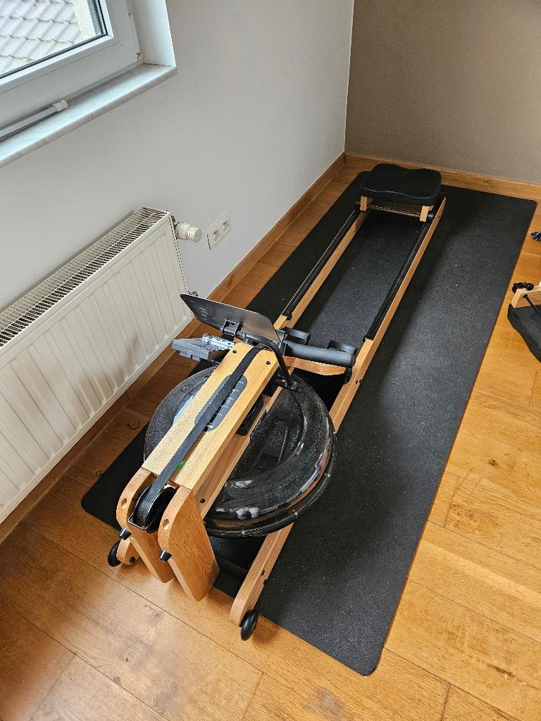 Roeitrainer inclusief zwarte beschermmat, Sport en Fitness, Fitnessapparatuur, Ophalen, Overige materialen, Benen, Zo goed als nieuw