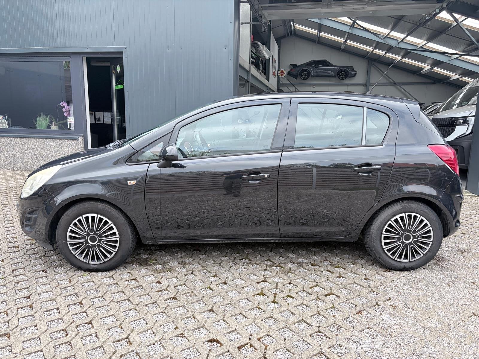 Opel Corsa 1,4 benzine - Automaat, Auto's, Euro 5, Gebruikt, Zwart, 4 cilinders