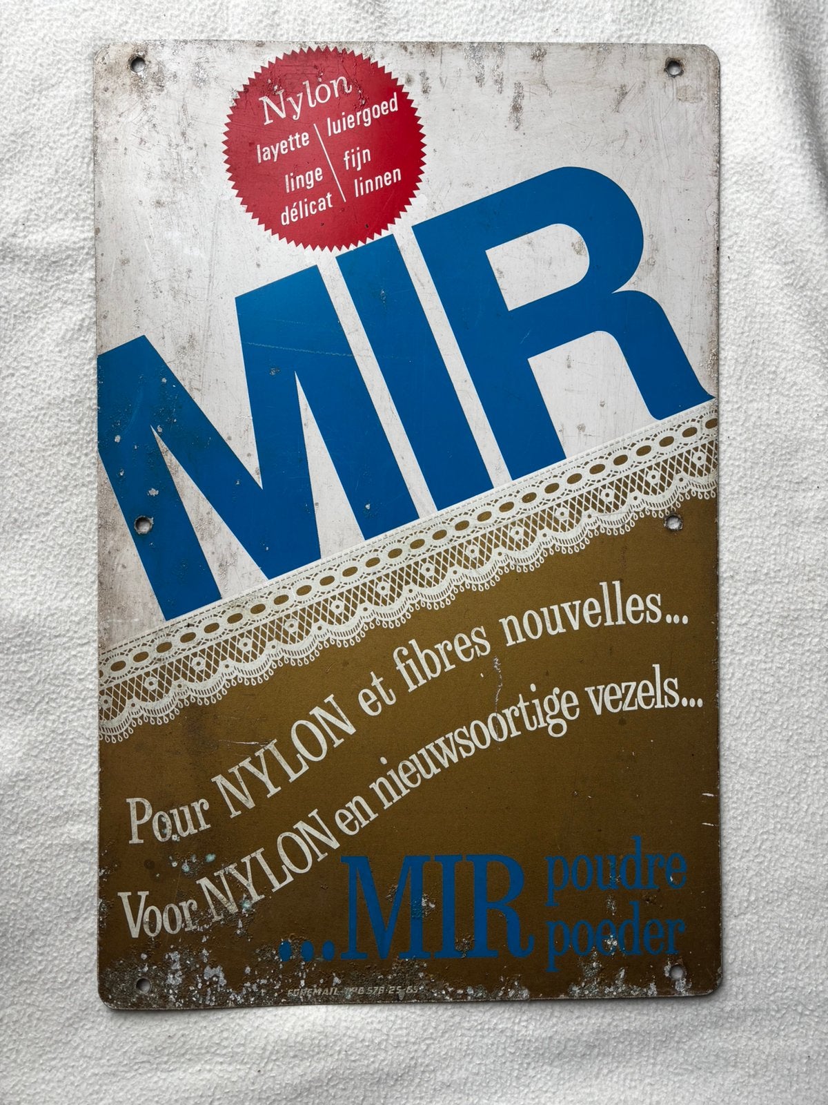Plaque publicitaire Mir bilingue 1965 état d’usure normal, Enlèvement ou Envoi, Utilisé