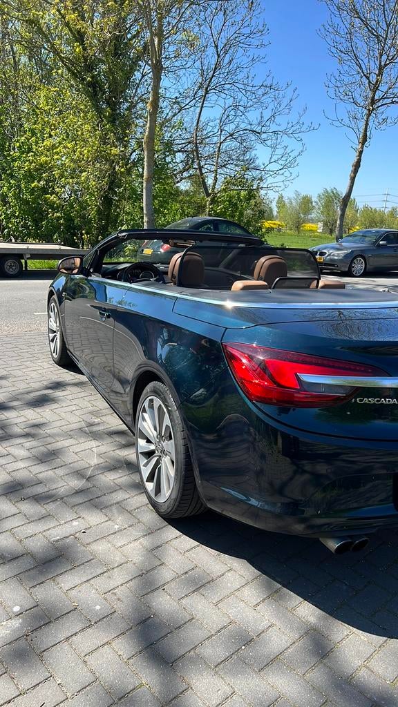Opel Cascada 1.6 turbo automaat, Autos, Cuir, Beige, Cabriolet, Carnet d'entretien