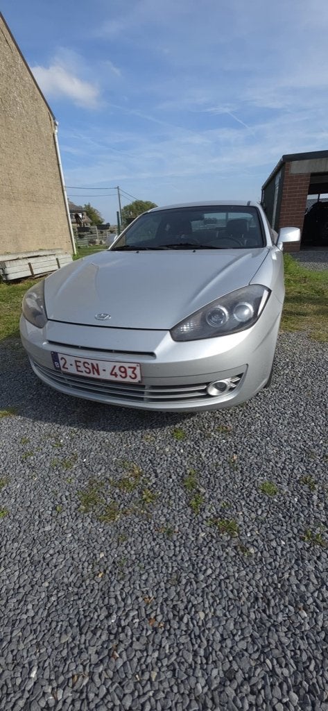 Hyundai Coupe 1.6i 16V, Auto's, Voorwielaandrijving, 4 zetels, Leder en Stof, Handgeschakeld