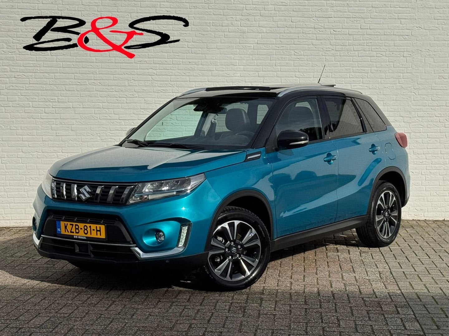 Suzuki Vitara 1.5 Hybrid Style Rhino Edition Automaat Pano C, Auto's, Automaat, Adaptive Cruise Control, Blauw, Bedrijf