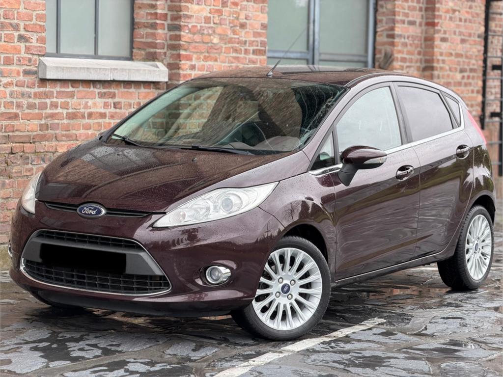 Ford Fiesta Titanium 1.25i benzine met 69.000km!, Autos, Euro 5, Achat, Boîte manuelle, 5 portes