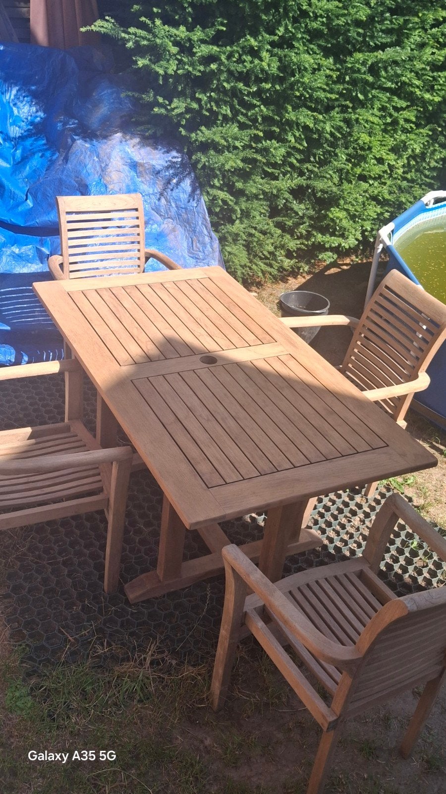 Ensemble teck massif naturel, table160cm x 90cm +4 fauteuils