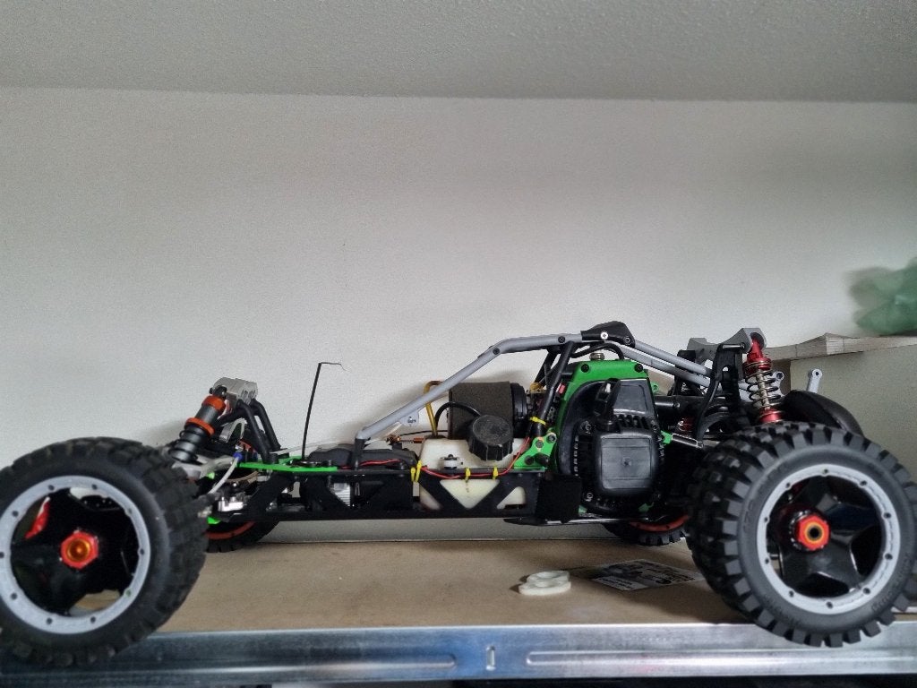 1 op 10 benzine buggy, Hobby & Loisirs créatifs, Voitures miniatures | Échelles Autre, Enlèvement ou Envoi, Utilisé, Voiture