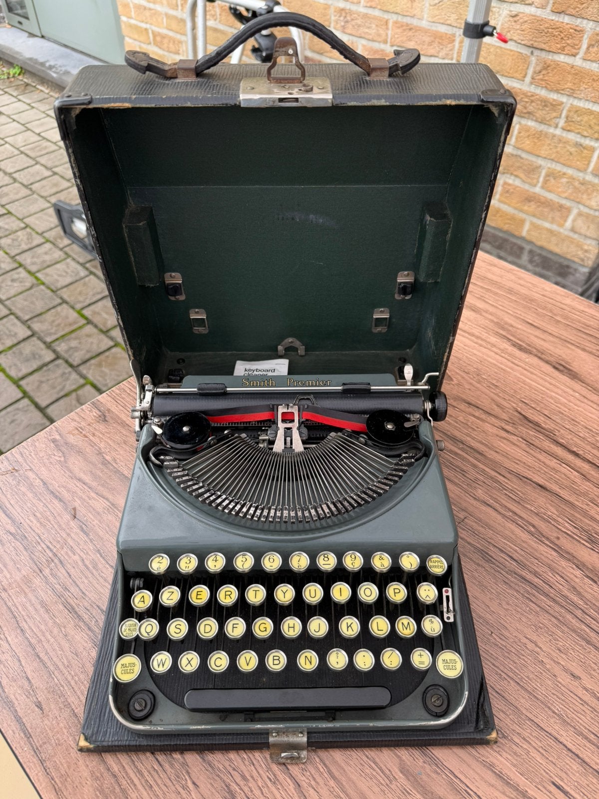 Typmachine, Ophalen, Zo goed als nieuw
