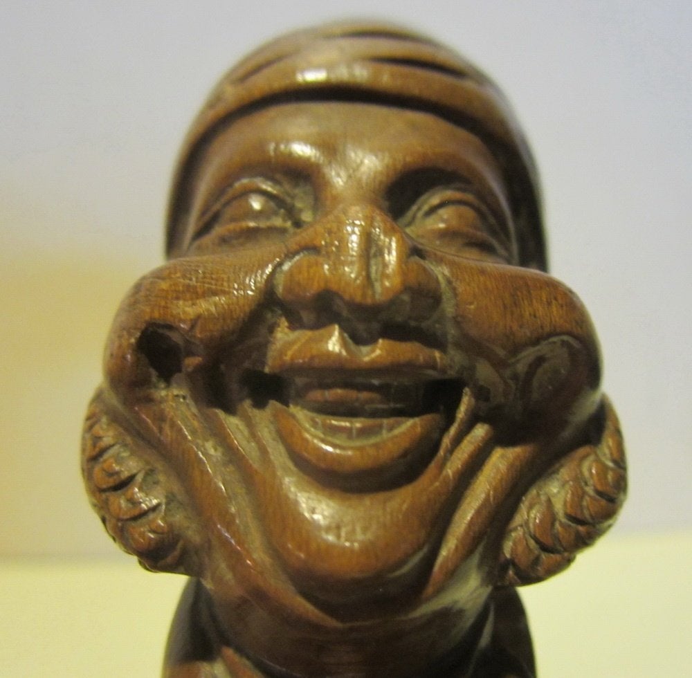 Antieke bronzen bel met handgesneden houten hoofd, Verzenden