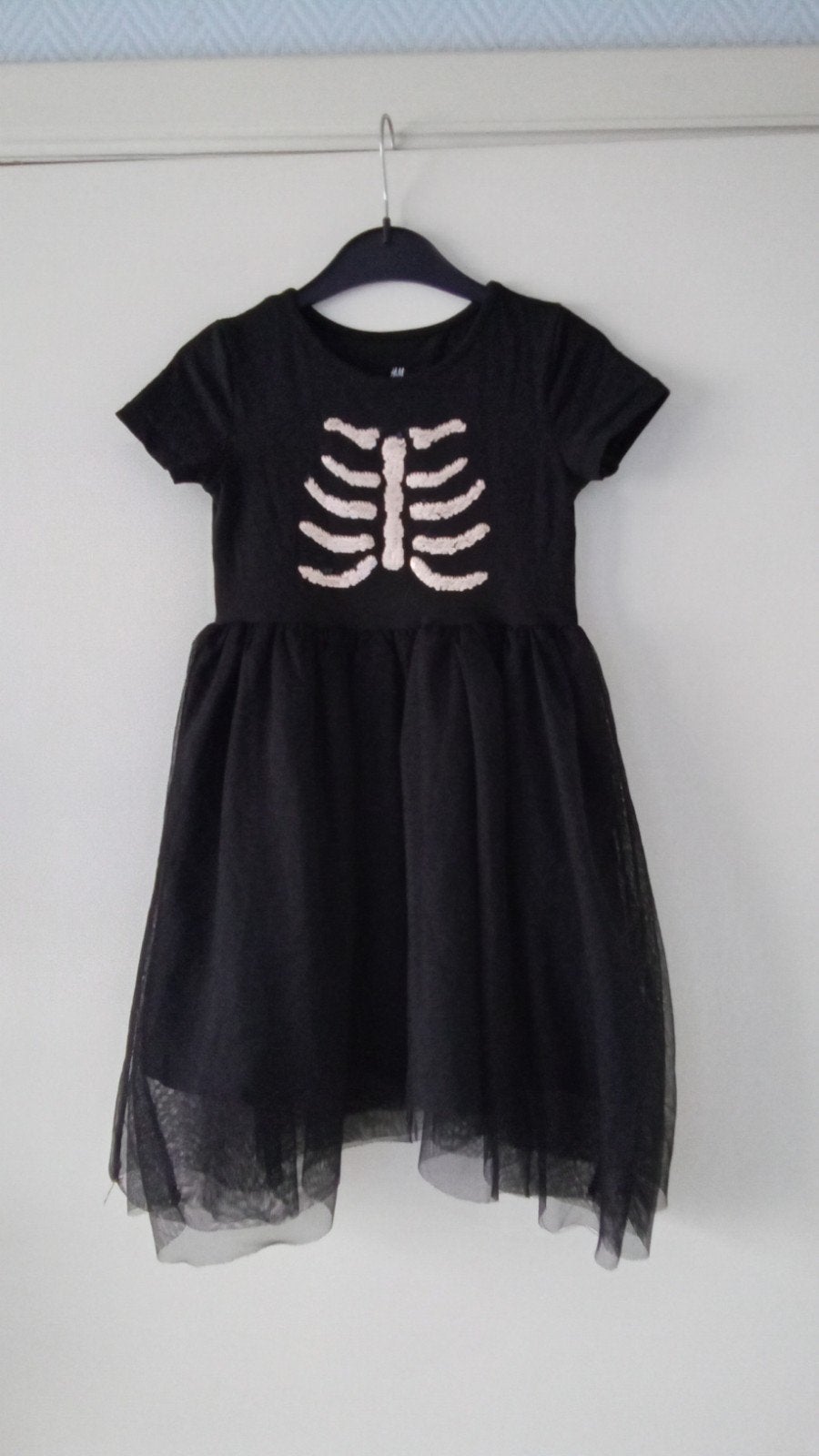 Leuk Halloween kleedje, Ophalen
