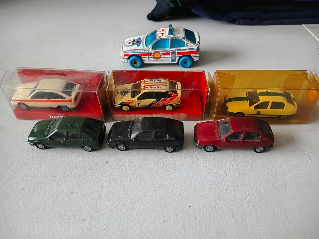 7 miniatuur Opel Kadett E..6 x  schaal 1/87, Ophalen