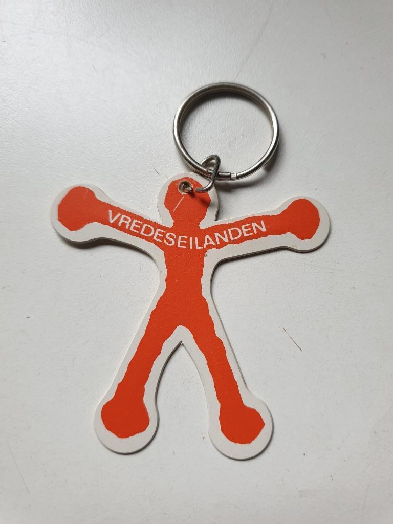 sleutelhanger Vredeseilanden wit / oranje - rood, Verzamelen, Ophalen of Verzenden, Gebruikt, Overige typen