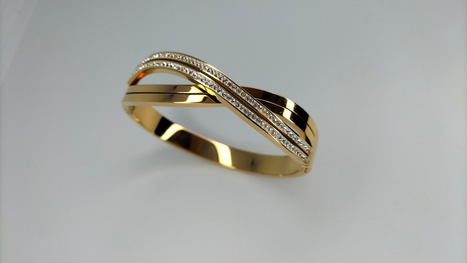goudkleurige infinity armband, Handtassen en Accessoires, IJzer of Staal, Nieuw, Ophalen of Verzenden, Dame