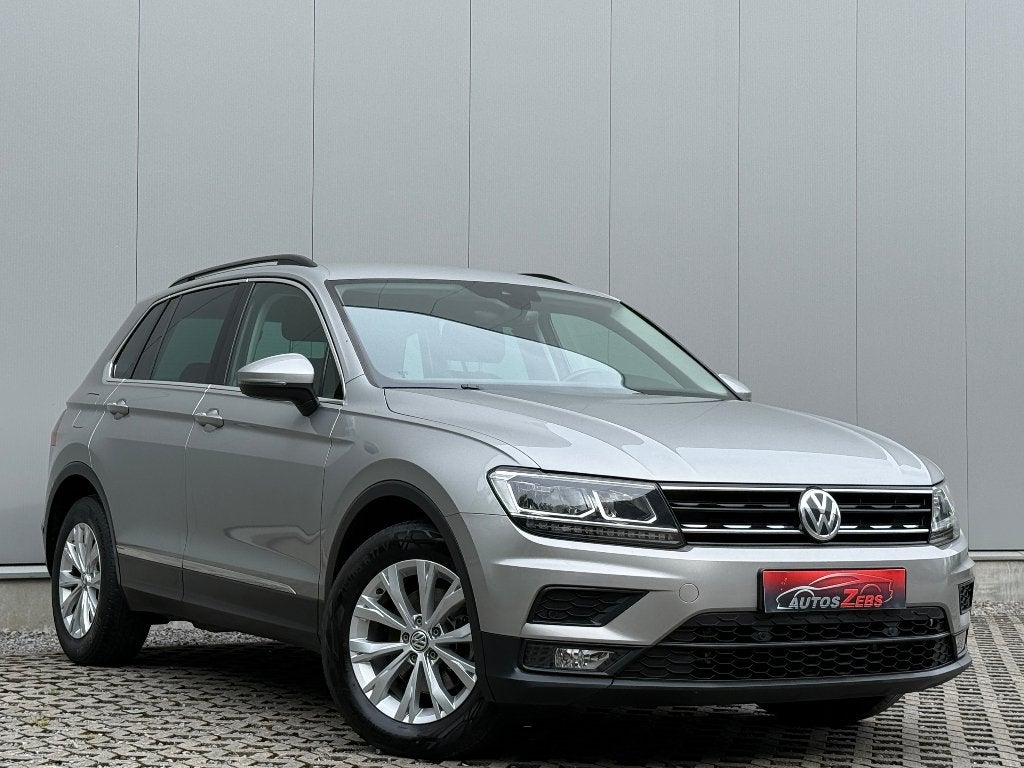 VW Tiguan 2.0 TDi DSG AdapCruise LijnASS ParkSensor Euro6, Auto's, Stof, 4 cilinders, 127 g/km, 2170 kg