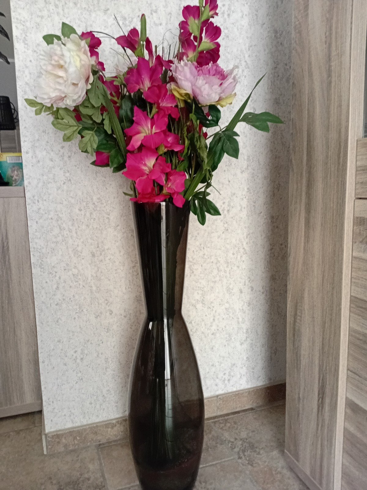 vase avec des fleurs, Enlèvement