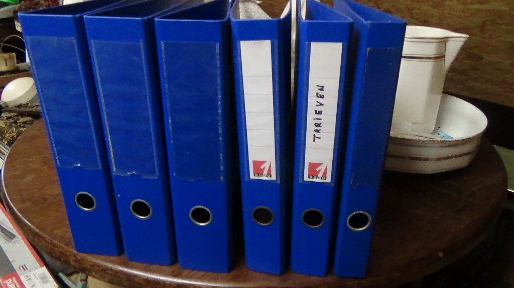 5 blauwe classeurs, Enlèvement
