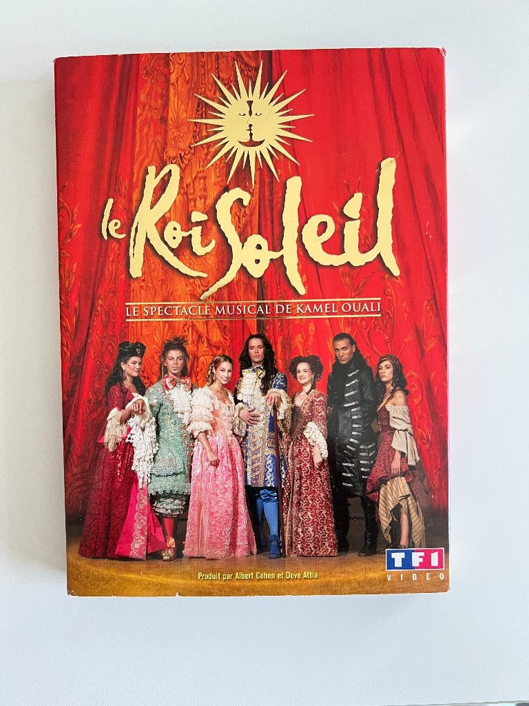 DVD du spectacle musical de Kamel Ouali Le Roi Soleil, Enlèvement ou Envoi, Tous les âges, Français, Utilisé