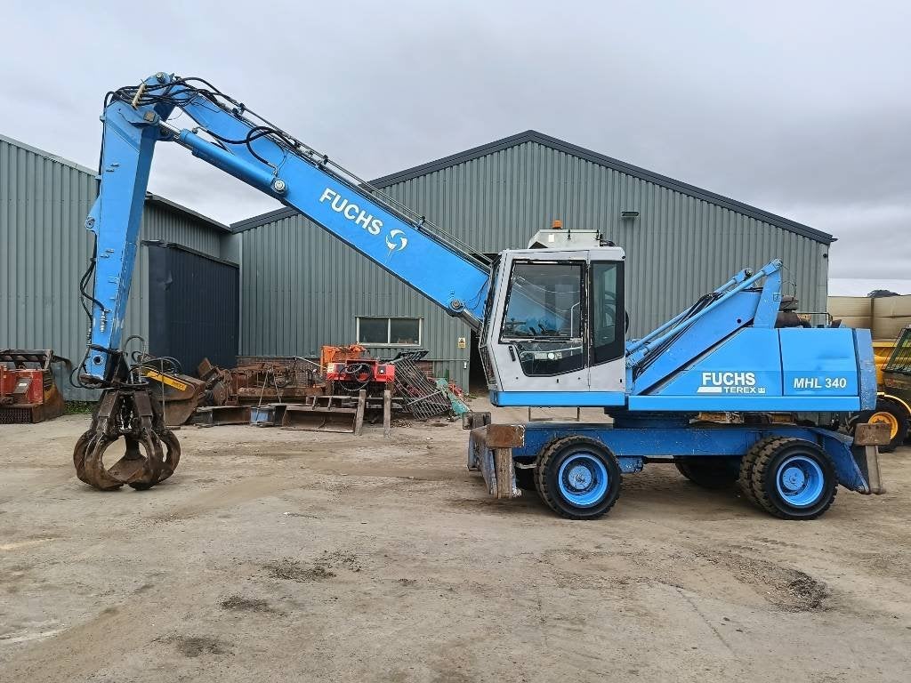 Fuchs MHL 340 waste industry handler umslagbagger (bj 2001), Zakelijke goederen, Machines en Bouw | Kranen en Graafmachines, Kraan