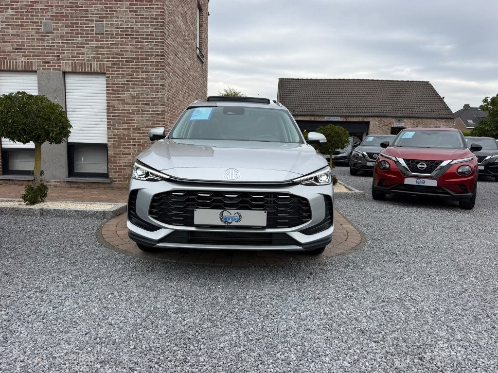 MG ZS Hybrid+ 1.5 Luxury 197PK PANO 7J/GAR NIEUW 0KM, Auto's, Automaat, 145 kW, 1498 cc, 4 cilinders
